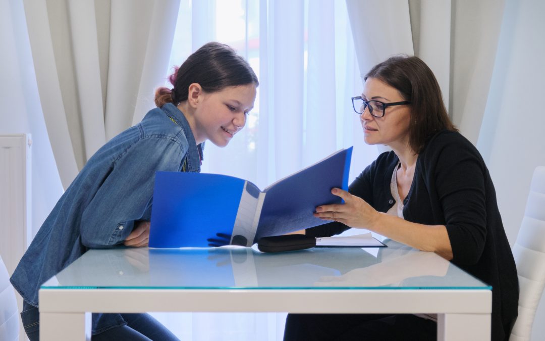 female teacher teaching teenage girl individually private lessons